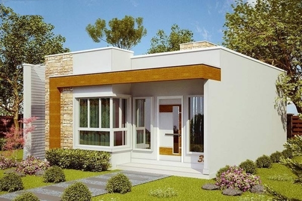Nhà cấp 4 mái bằng tuy diện tích nhỏ nhưng có điểm nhấn riêng với hệ thống khung nhôm kính, gạch ốp tường. Bao quanh nhà là khu vườn có hoa lá, cây xanh tràn ngập không gian thiên nhiên